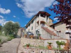 Foto In collina "Casa L'Oliveta", semindipendente con giardino e vista strepitosa!